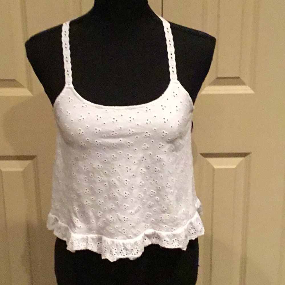 Two white and blue eyelid tops